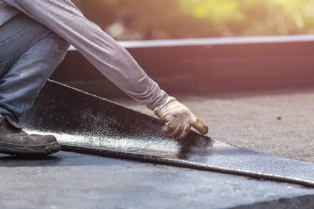 Professional Waterproofing technician working in Russellville, IN